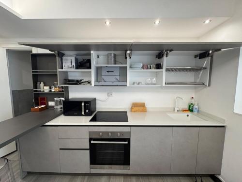 a kitchen with a sink and a counter top at ApartBergamo in Bergamo