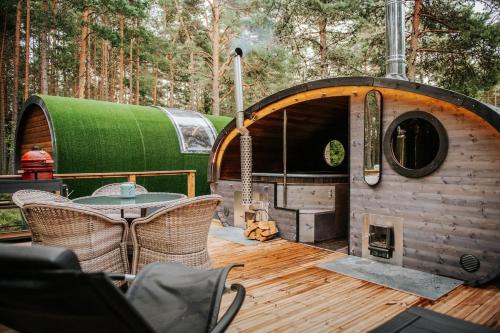Foto Panoramic Tube with Sauna & Hot Tub 1