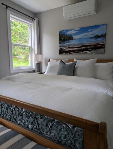 Ένα ή περισσότερα κρεβάτια σε δωμάτιο στο Lakeview Hideaway