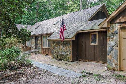 a house with a flag on the side of it at Serene Acre Retreat- in Apex near Raleigh in Apex