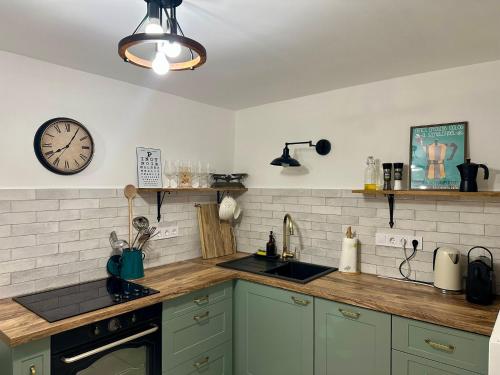 Kuchyň nebo kuchyňský kout v ubytování Fenn a Hegyen Vendégház Somló