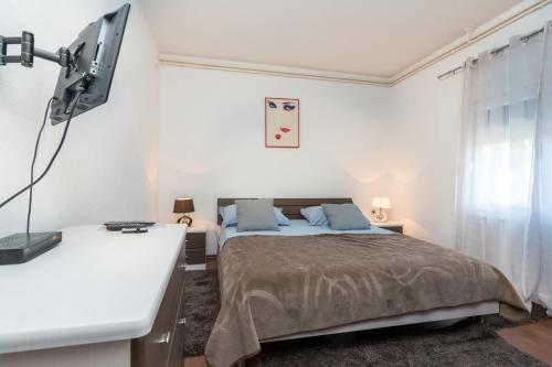 Postel nebo postele na pokoji v ubytování Apartman Verica