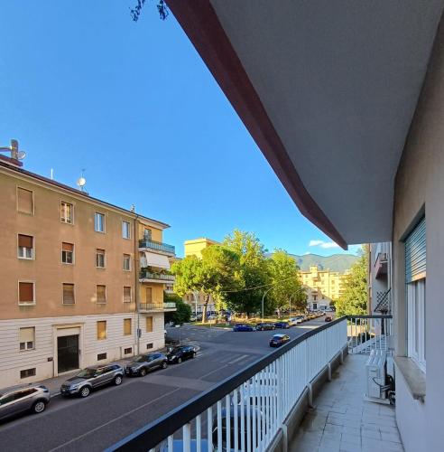 a view of a city street from a balcony at Casa Maricciotti in Terni