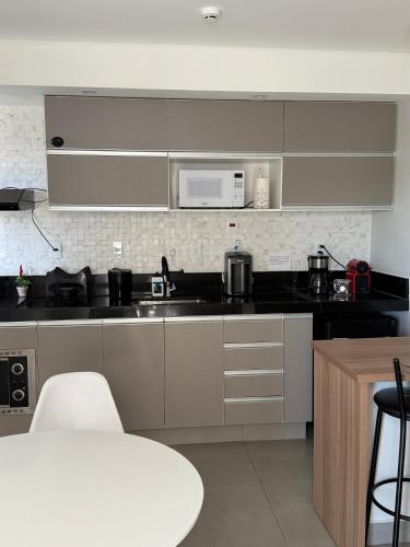 Η κουζίνα ή μικρή κουζίνα στο Diamond Flat, conforto completo!