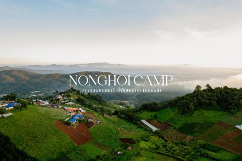 an aerial view of a farm with the nnorotin camp sign in the background at เต็นท์ดูดาว1 แอร์ ม่อนแจ่ม วิวดอยหลวงเชียงดาว in Mon Jam