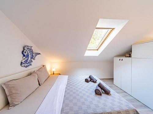 Giường trong phòng chung tại Holiday Home Island Gem - Five Bedroom Apartment