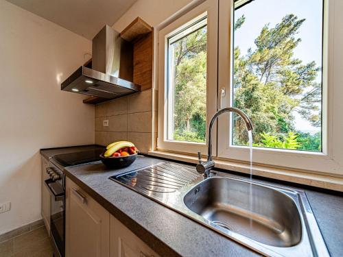 Nhà bếp/bếp nhỏ tại Holiday Home Island Gem - Five Bedroom Apartment