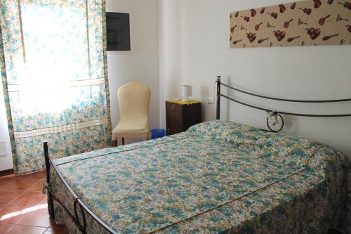 Ein Bett oder Betten in einem Zimmer der Unterkunft Bed & Breakfast L'Infernot