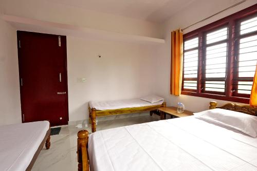 Ένα ή περισσότερα κρεβάτια σε δωμάτιο στο Sogadu Homestay - Full Villa, 4BH, Estate, Home Food