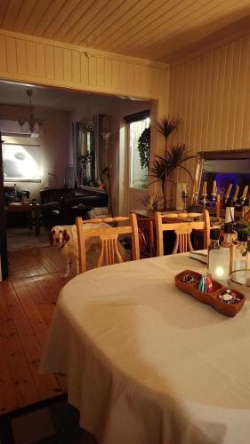 a room with a table with a tray on top of it at Landgård Feriehus in Trysil