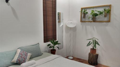 Postel nebo postele na pokoji v ubytování La Sen-Thường Xuân