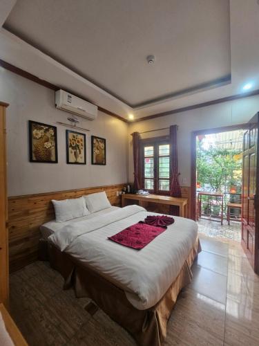 Ένα ή περισσότερα κρεβάτια σε δωμάτιο στο Dang Khoa Garden Inn