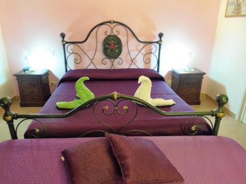 A bed or beds in a room at Aecolibrium Country House