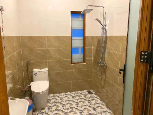 Et badeværelse på Homestay Ly Angela