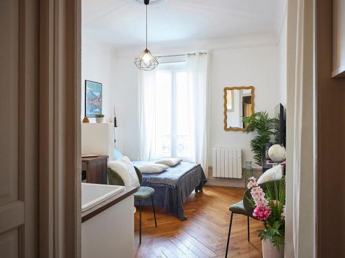 Ένα ή περισσότερα κρεβάτια σε δωμάτιο στο Charmant studio moderne avec wifi et animaux admis - FR-1-555-119