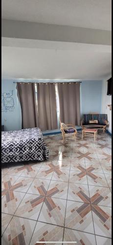 Ένα ή περισσότερα κρεβάτια σε δωμάτιο στο Casa Kukulcán #2