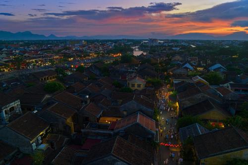 an overhead view of a city at night at HA Ocean Front Hotel and Apartment in Hoi An