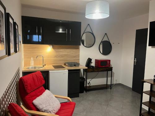 Η κουζίνα ή μικρή κουζίνα στο Appartement 2 proche Tricastin, Pierrelatte