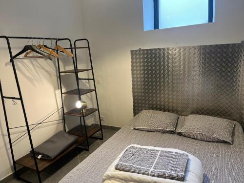 Katil atau katil-katil dalam bilik di Appartement 2 proche Tricastin, Pierrelatte