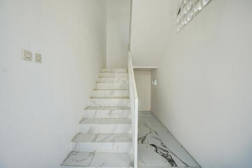 Φωτογραφία από το άλμπουμ του OYO 94766 Tapak Liman Syariah σε Dau