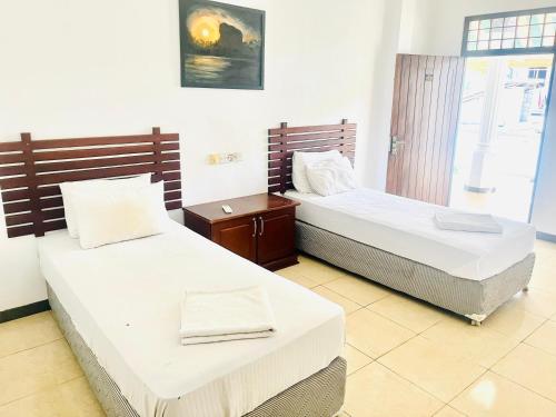 Postel nebo postele na pokoji v ubytování Lifestyle Romano Hotel