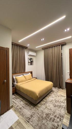 a bedroom with a bed in a room at Italia Hotel cairo in Cairo
