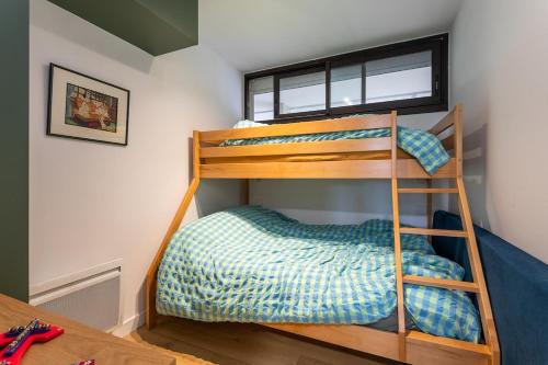 En eller flere senge i et værelse på Lovely terrace apartment in LGM