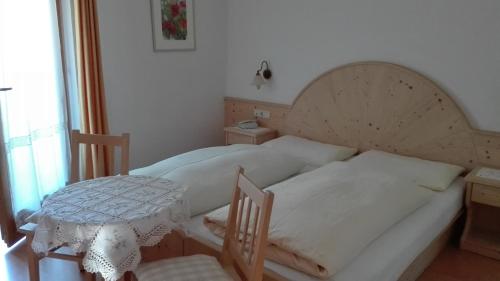 Postel nebo postele na pokoji v ubytování Pensione Valbona