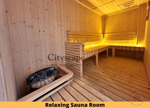 a sauna with a bench in a wooden room at Majestic Residence Kuala Lumpur by Cityscape in Kuala Lumpur