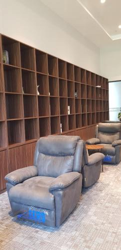a living room with a couch and two chairs at Calm Lux 3 BR 2 Baths next to AEON Mall in Cilandak