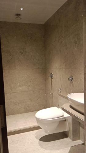 Koupelna v ubytování Atithi Deluxe Rooms