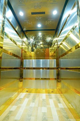 a bowling alley with glass walls and aoc at Hotel Maharaja Palace Boutique Hotels Near Medanta Medicity Gurgaon in Gurgaon