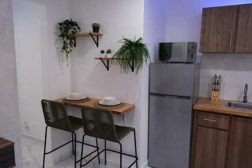 Η κουζίνα ή μικρή κουζίνα στο Chic 1BR apartment