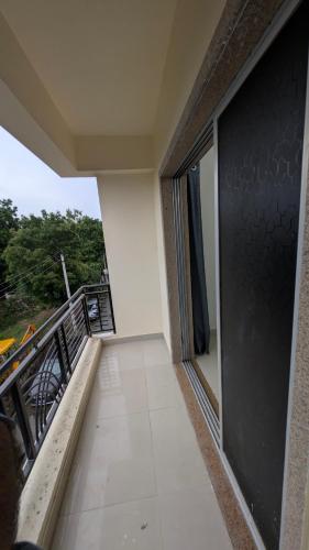 a balcony of a building with a view of the outside at Jalsa Home Stay in Sheoganj