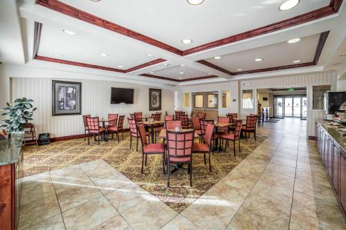 a restaurant with tables and chairs in a room at Comfort Inn & Suites Rock Springs-Green River in Rock Springs