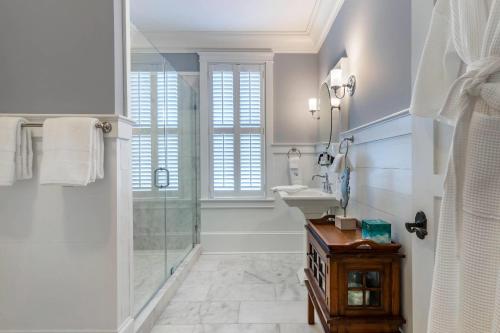 a bathroom with a shower and a sink at Inn at I'On, an Ascend Collection Hotel in Charleston
