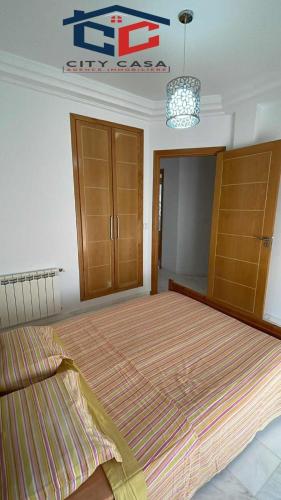 Una cama o camas en una habitación de L'Hippocampe residence