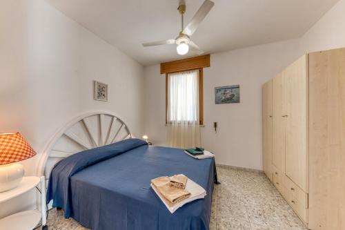 Postel nebo postele na pokoji v ubytování Baia Delle Sirene Leuca Le