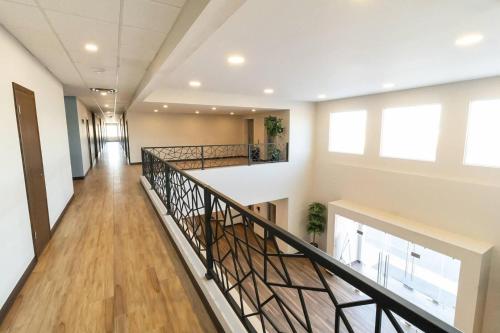 a hallway with a staircase in a building at Comfort Inn Ciudad Juarez in Ciudad Juárez