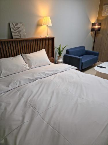 Katil atau katil-katil dalam bilik di Icheon Hotel Hutis
