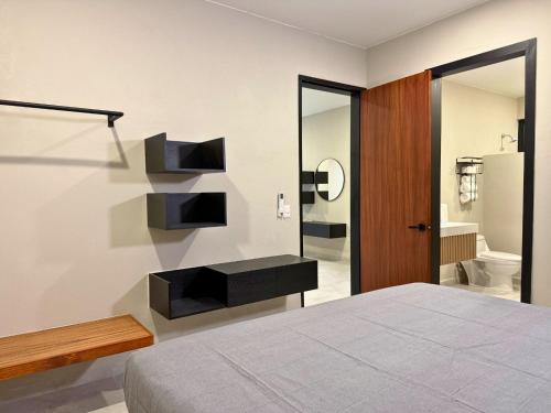 Ένα ή περισσότερα κρεβάτια σε δωμάτιο στο Rooms Sector M