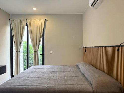 Ένα ή περισσότερα κρεβάτια σε δωμάτιο στο Rooms Sector M