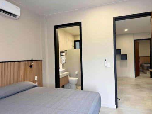 Ένα ή περισσότερα κρεβάτια σε δωμάτιο στο Rooms Sector M