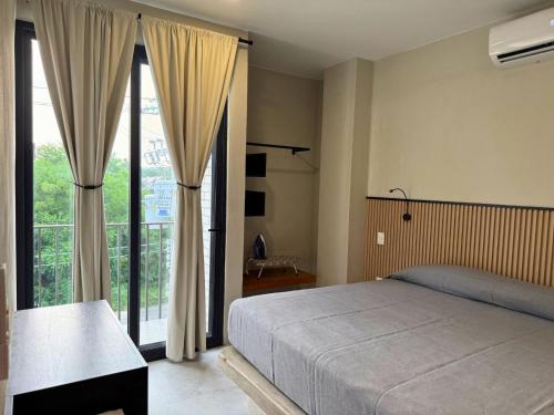 Ένα ή περισσότερα κρεβάτια σε δωμάτιο στο Rooms Sector M