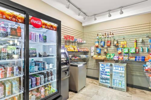 a grocery store aisle with drinks and food at Radisson Hotel Portland Airport in Portland
