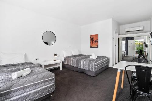 Cama o camas de una habitación en Comfort Inn Commodore Albury