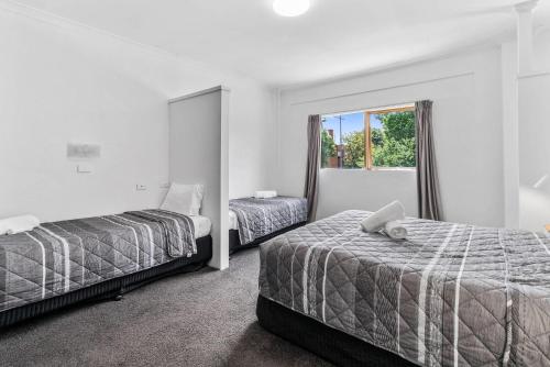 Cama o camas de una habitación en Comfort Inn Commodore Albury