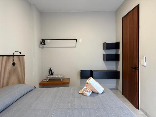 Ένα ή περισσότερα κρεβάτια σε δωμάτιο στο Rooms Sector M