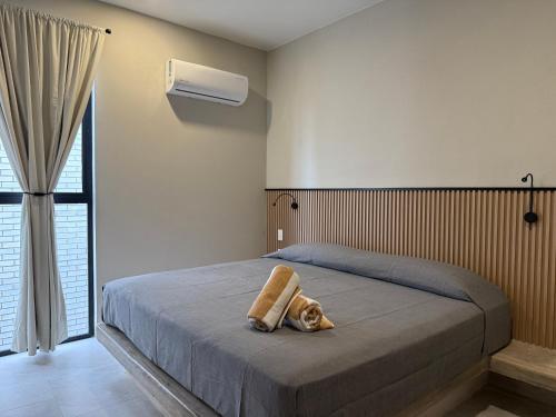 Ένα ή περισσότερα κρεβάτια σε δωμάτιο στο Rooms Sector M