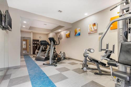 a fitness room with treadmills and cardio equipment at Comfort Inn & Suites in Saint Louis
